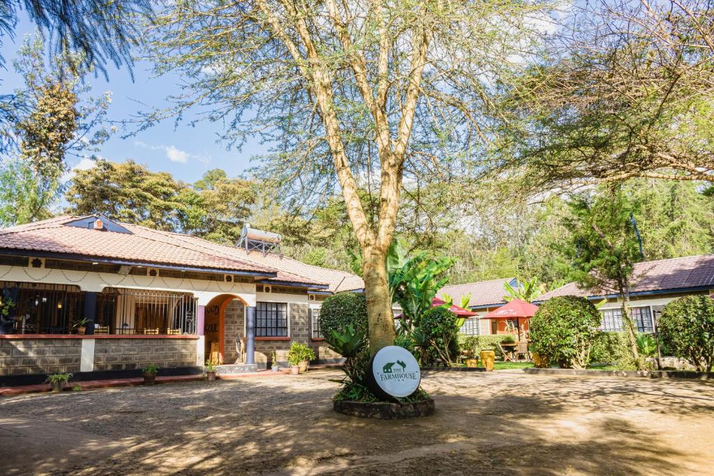 View from Farm Inn Hotel of lush trees and surrounding landscape.