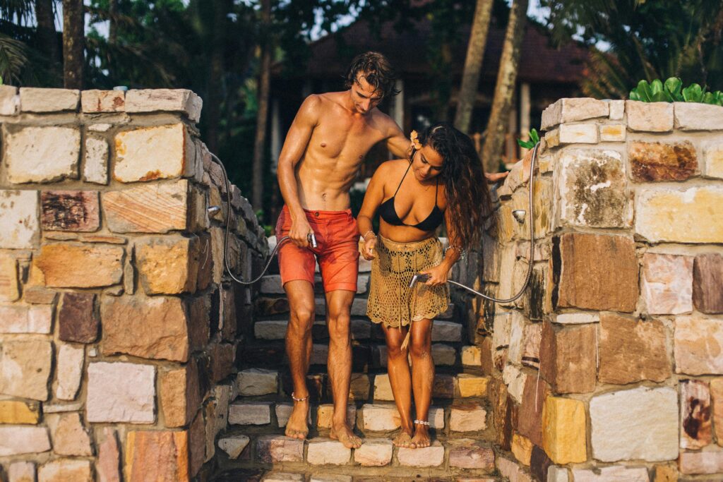 Couple relaxing on the beach in Watamu, Kenya for honeymoon and couples retreat