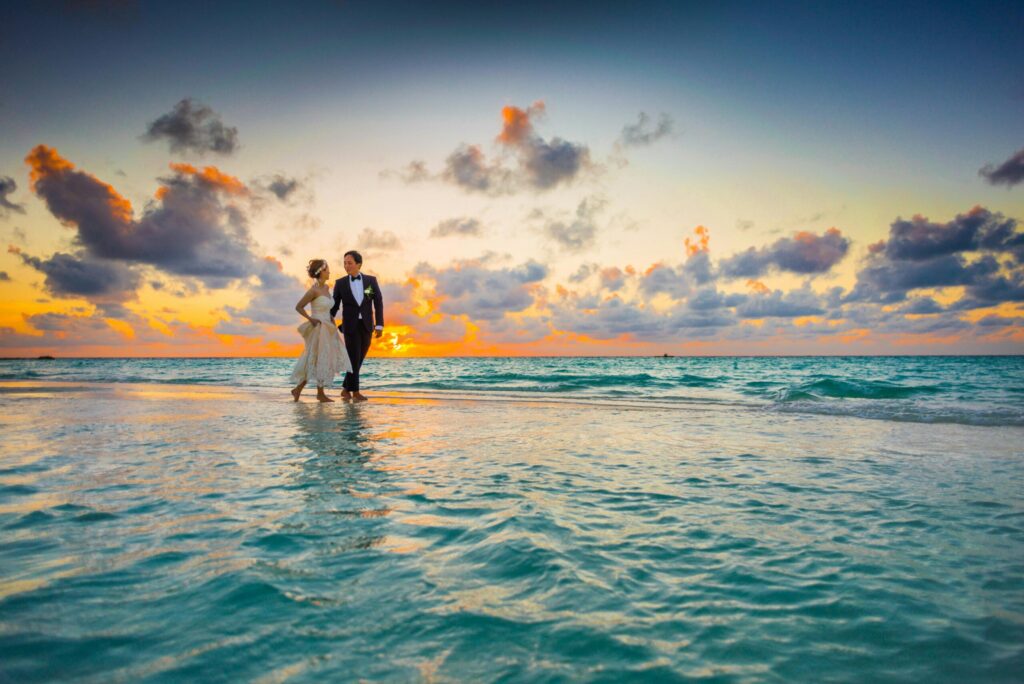 Romantic honeymoon couple on Diani Beach, Kenya